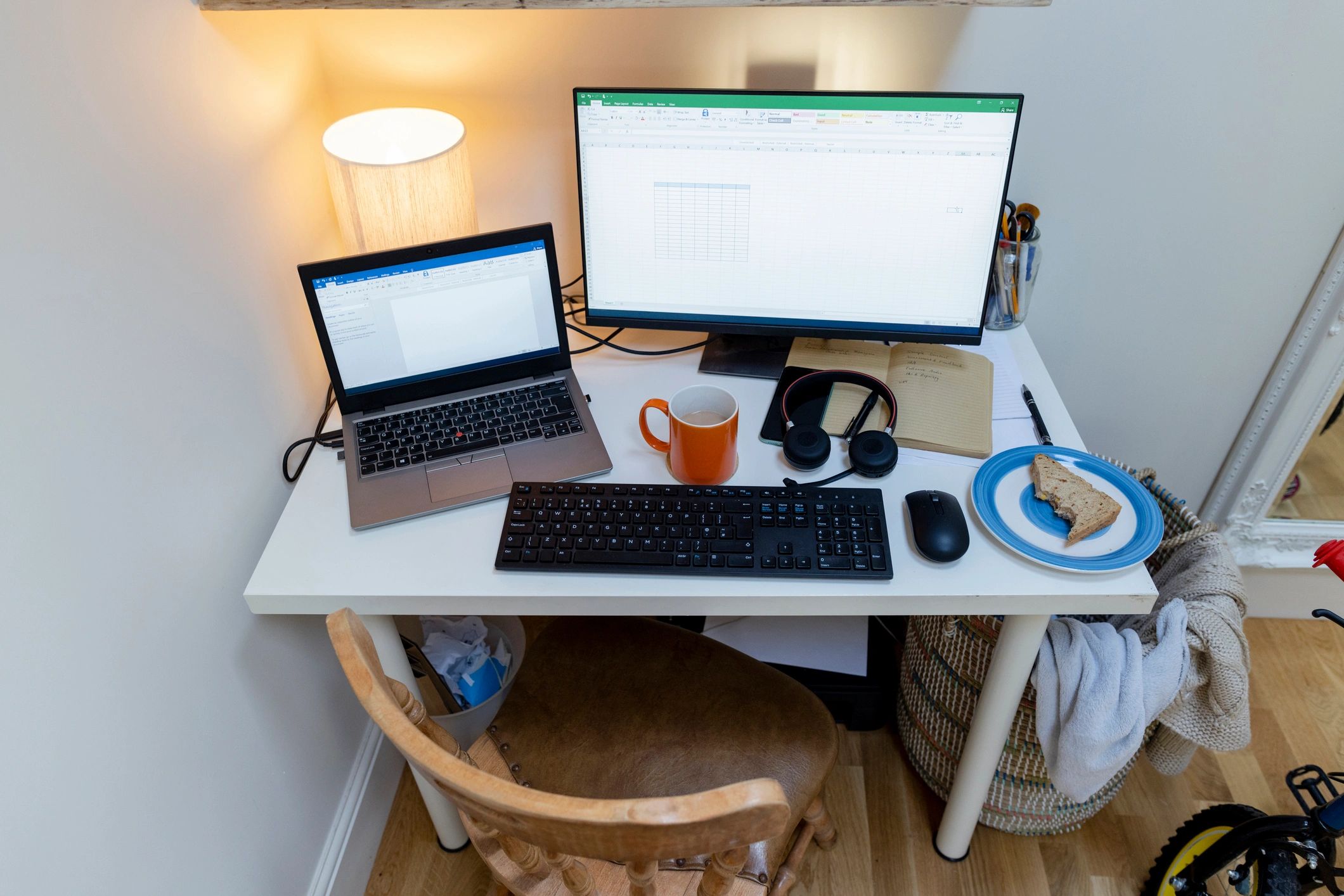 Modern workspace with monitors and desk